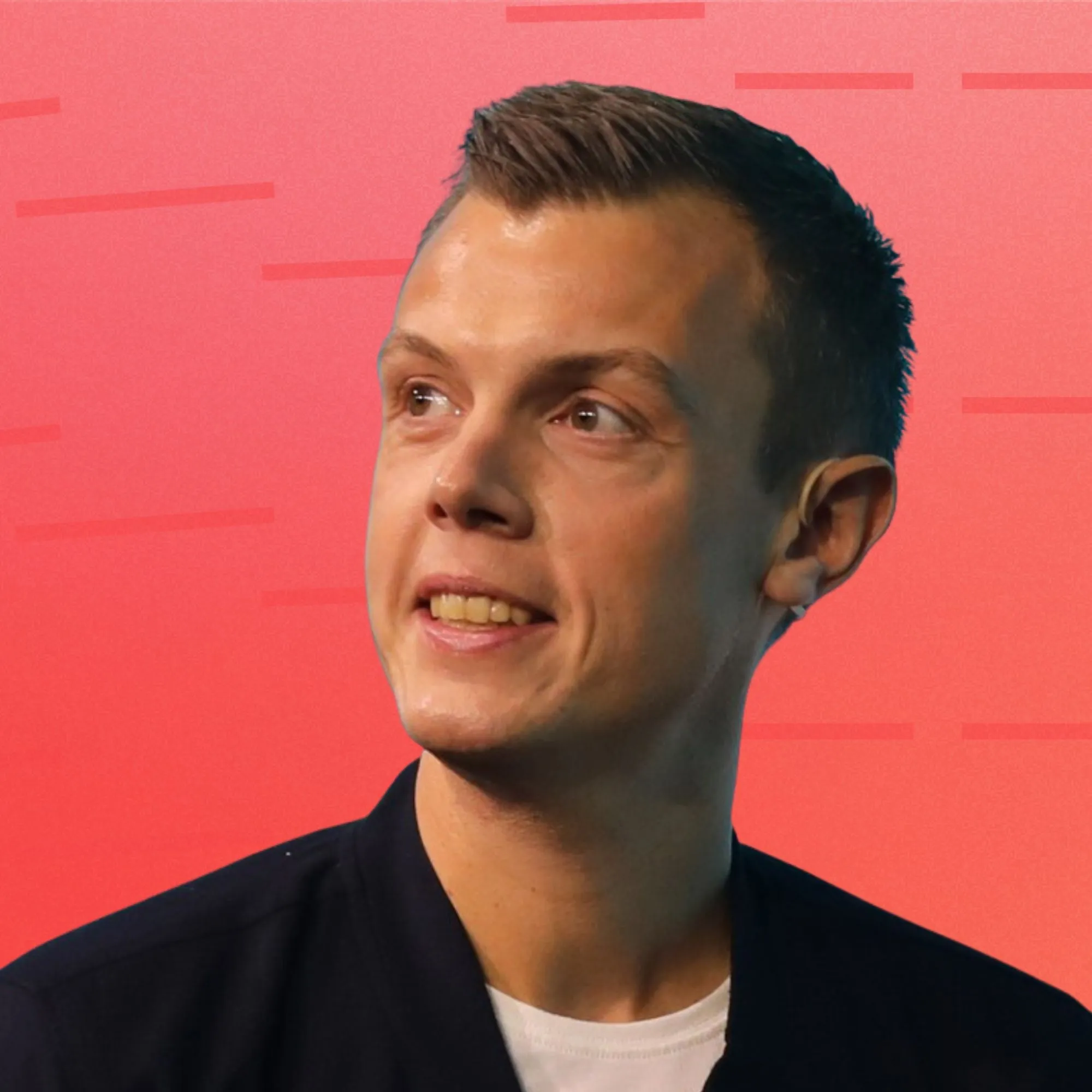Kasper Nissen, square headshot on a red background
